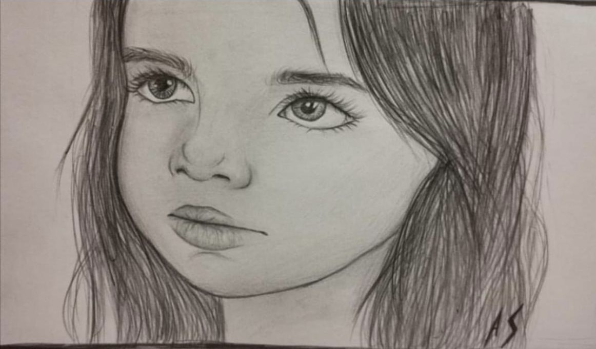 Portret artistic realizat în creion